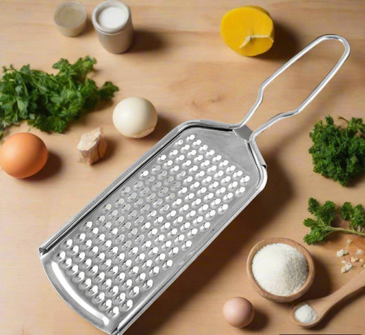 Stainless steel zester grater for zesting citrus, grating cheese, and nutmeg in the kitchen.