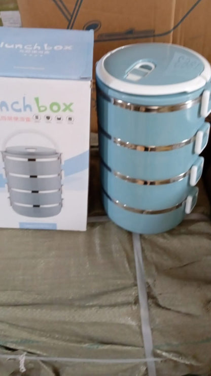 Stainless steel lunch box with four layers for hot food.