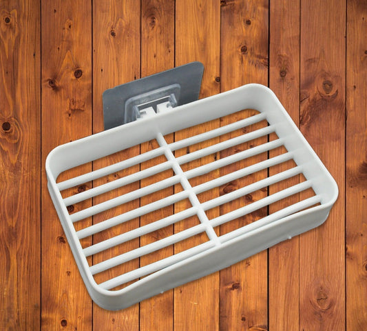 Self-adhesive plastic soap holder for bathroom and kitchen